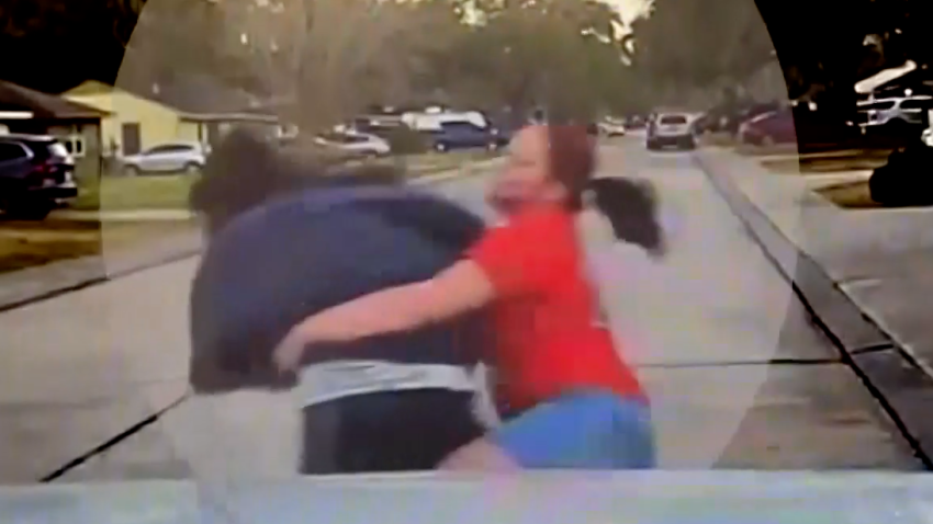 Mom Caught on Cam Tackling Peeping Tom