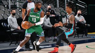 Tim Hardaway Jr. #11 of the Dallas Mavericks dribbles against the Memphis Grizzlies on Feb. 22, 2021 at the American Airlines Center in Dallas, Texas.