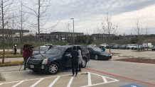 People registering for the COVID-19 vaccine at the Singing Hills Recreation Center in Dallas.