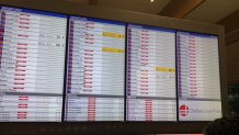 Arrivals and departures board at Dallas Love Field Airport on Sunday, Feb. 14, 2021.