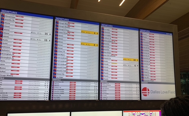 Arrivals and departures board at Dallas Love Field Airport on Sunday, Feb. 14, 2021.