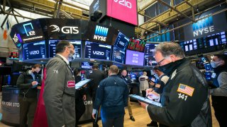Traders work on the floor of the New York Stock Exchange.