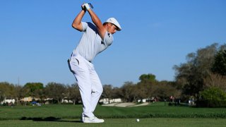 Bryson DeChambeau of the United States plays his shot from the 11th tee during the final round of the Arnold Palmer Invitational Presented by MasterCard at the Bay Hill Club and Lodge on March 7, 2021 in Orlando, Florida.