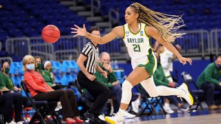 DiJonai Carrington #21 of the Baylor Lady Bears chases down a loose ball during the first half in the first round game of the 2021 NCAA Women's Basketball Tournament at the Alamodome on March 21, 2021 in San Antonio, Texas.