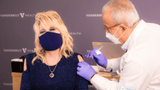 Dolly Parton receives her coronavirus vaccine in Nashville, Tennessee.