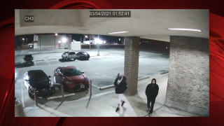 Surveillance footage of two men outside of Altamesa Blvd. game room