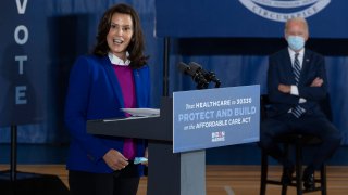 Michigan Governor Gretchen Whitmer introduces Democratic Presidential Candidate Joe Biden to speak at Beech Woods Recreation Center in Southfield, Michigan, on October 16, 2020. - Joe Biden on October 16, 2020 described President Donald Trump's reluctance to denounce white supremacists as "stunning" in a hard-hitting speech in battleground Michigan with 18 days to go until the election.