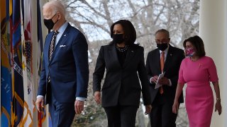 (from L) US President Joe Biden, US Vice President Kamala Harris, US Senate Majority Leader Chuck Schumer, Democrat of New York, and House Speaker Nancy Pelosi, Democrat of California, arrive for an event on the American Rescue Plan in the Rose Garden of the White House in Washington, DC, on March 12, 2021.