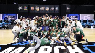 The Baylor Bears celebrate their win over the Arkansas Razorbacks in the Elite Eight round of the 2021 NCAA Division I Men's Basketball Tournament held at Lucas Oil Stadium on March 29, 2021 in Indianapolis, Indiana.