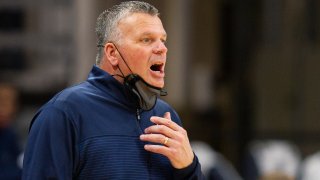 Creighton coach Greg McDermott shouts during the first half of the team's NCAA college basketball game against Villanova, Wednesday, March 3, 2021, in Villanova, Pennsylvania.