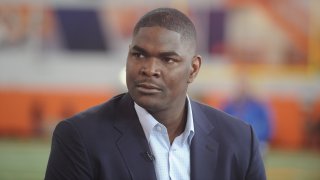 In this March 6, 2014, file photo, former NFL player Keyshawn Johnson looks on during the Clemson football Pro Day in Clemson, South Carolina. Johnson announced on Monday, March 15, 2021, that his daughter died at the age of 25.