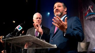 FILE: U.S. Senators Ted Cruz (R) and John Cornyn take part in the astronaut graduation ceremony at Johnson Space Center in Houston Texas, on Jan. 10, 2020.