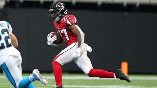 Damontae Kazee #27 of the Atlanta Falcons rushes after making an interception during the second half of the game against the Carolina Panthers at Mercedes-Benz Stadium on Dec. 8, 2019 in Atlanta, Georgia.