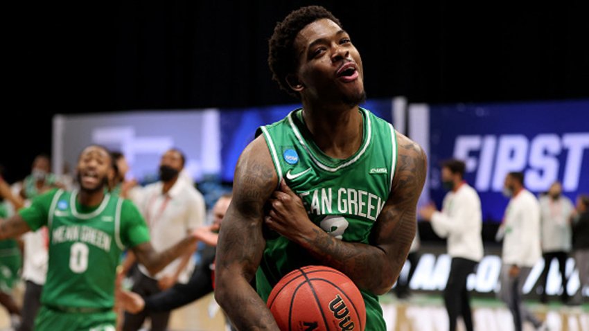 Javion Hamlet #3 of the North Texas Mean Green celebrates after defeating the Purdue Boilermakers in the first round of the 2021 NCAA Division I Mens Basketball Tournament held at Lucas Oil Stadium on March 19, 2021 in Indianapolis, Indiana.