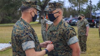 Duncanville Marine Sgt. Danny P. McDonald, right, was awarded the Navy and Marine Corps medal for his heroic actions.