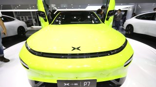 A Xpeng P7 electric car is on display during the 18th Guangzhou International Automobile Exhibition at China Import and Export Fair Complex on November 20, 2020 in Guangzhou, Guangdong Province of China.