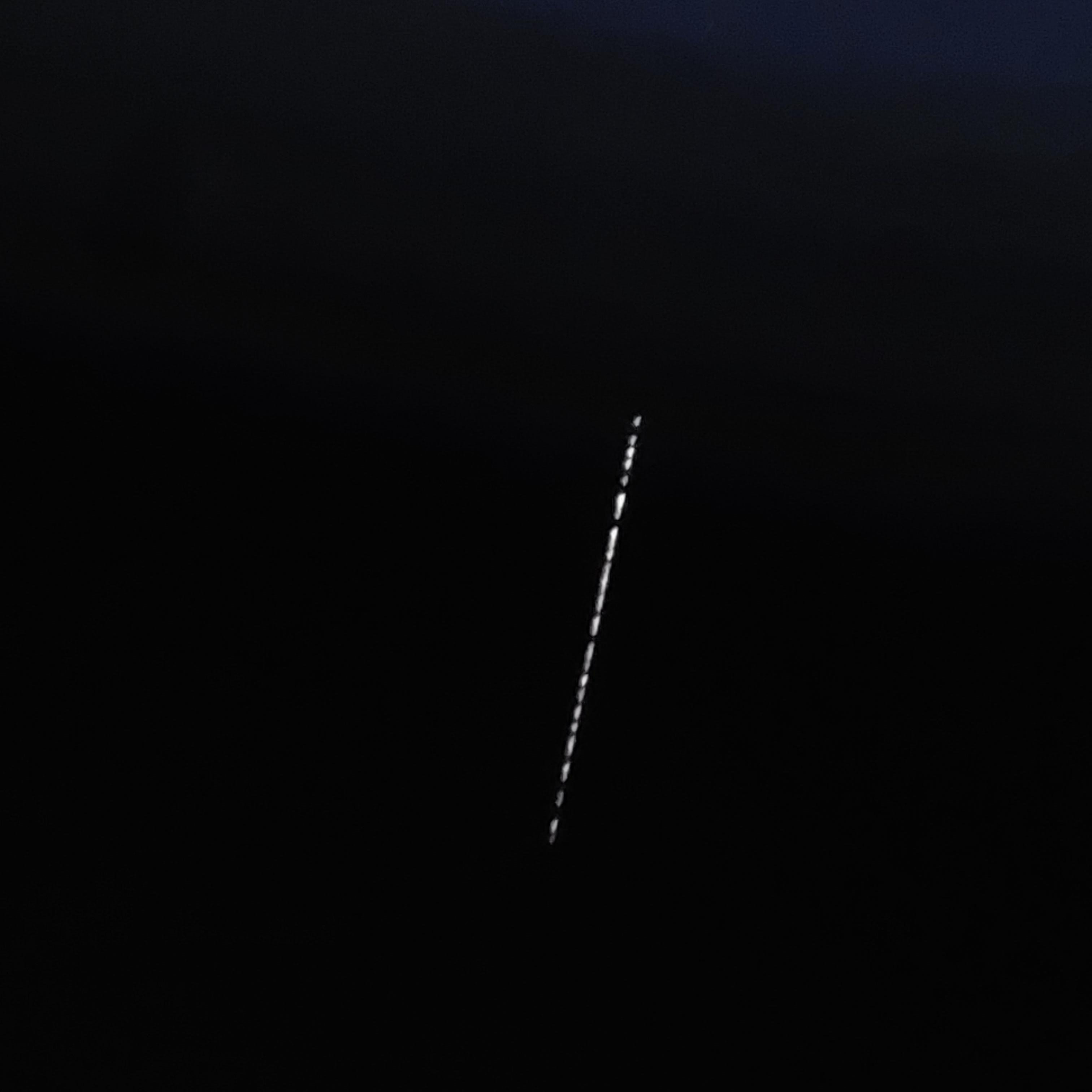 Starlink satellites look strange, but they're not UFOs. They belong to Elon  Musk.