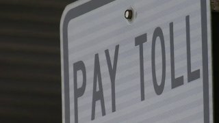 Pay Toll sign