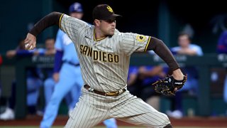 Craig Stammen #34 of the San Diego Padres throws against the Texas Rangers in the first inning at Globe Life Field on April 11, 2021 in Arlington, Texas.