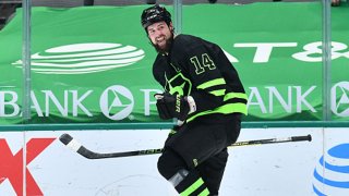 Jamie Benn #14 of the Dallas Stars celebrates a game-winning overtime goal against the Carolina Hurricanes at the American Airlines Center on April 26, 2021 in Dallas, Texas.