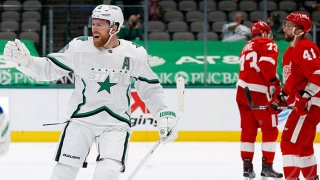 Joe Pavelski #16 of the Dallas Stars celebrates after assisting Jason Robertson #21 of the Dallas Stars in a goal against the Detroit Red Wings in the second period at American Airlines Center on April 19, 2021 in Dallas, Texas.