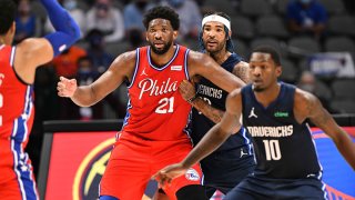 Joel Embiid #21 of the Philadelphia 76ers looks on during the game against the Dallas Mavericks on April 12, 2021 at the American Airlines Center in Dallas, Texas.