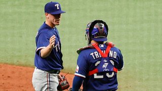 Kolby Allard #39 and Jose Trevino #23 of the Texas Rangers celebrate after defeating the Tampa Bay Rays by a score of 8 to 3 at Tropicana Field on April 13, 2021 in St Petersburg, Florida.