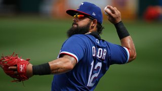 Rougned Odor #12 of the Texas Rangers warms up prior to the MLB spring training baseball game against the Los Angeles Dodgers at Surprise Stadium on March 7, 2021 in Surprise, Arizona.