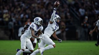 TCU Horned Frogs safety Trevon Moehrig (7) and TCU Horned Frogs safety Vernon Scott (26) celebrate a interception during the college football game between the Purdue Boilermakers and TCU Horned Frogs on Sept. 14, 2019, at Ross-Ade Stadium in West Lafayette, Indiana.