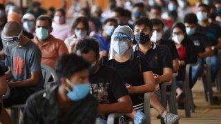 People aged 18 and over waiting to be inoculated against Covid-19 at a vaccination centre at Radha Soami Satsang grounds being run by BLK-Max hospital on May 4, 2021 in New Delhi, India.