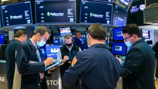Traders on the floor of the New York Stock Exchange.