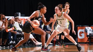 Betnijah Laney #44 of the New York Liberty handles the ball as Marina Mabrey #3 of the Dallas Wings plays defense during the game on May 24, 2021 at Barclays Center in Brooklyn, New York.