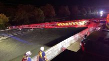 Emergency crews conduct high water rescues Saturday along Interstate 45 in Palmer.