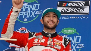 Chase Elliott, driver of the #9 Llumar Chevrolet, celebrates in victory lane after winning the NASCAR Cup Series EchoPark Texas Grand Prix at Circuit of The Americas on May 23, 2021 in Austin, Texas.