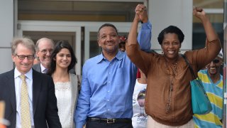 In this file photo, Darryl Anthony Howard (middle) and wife Nannie Howard (right) leave the Durham County Detention Center victorious with their lawyers and family on Wednesday, Aug. 31, 2016.