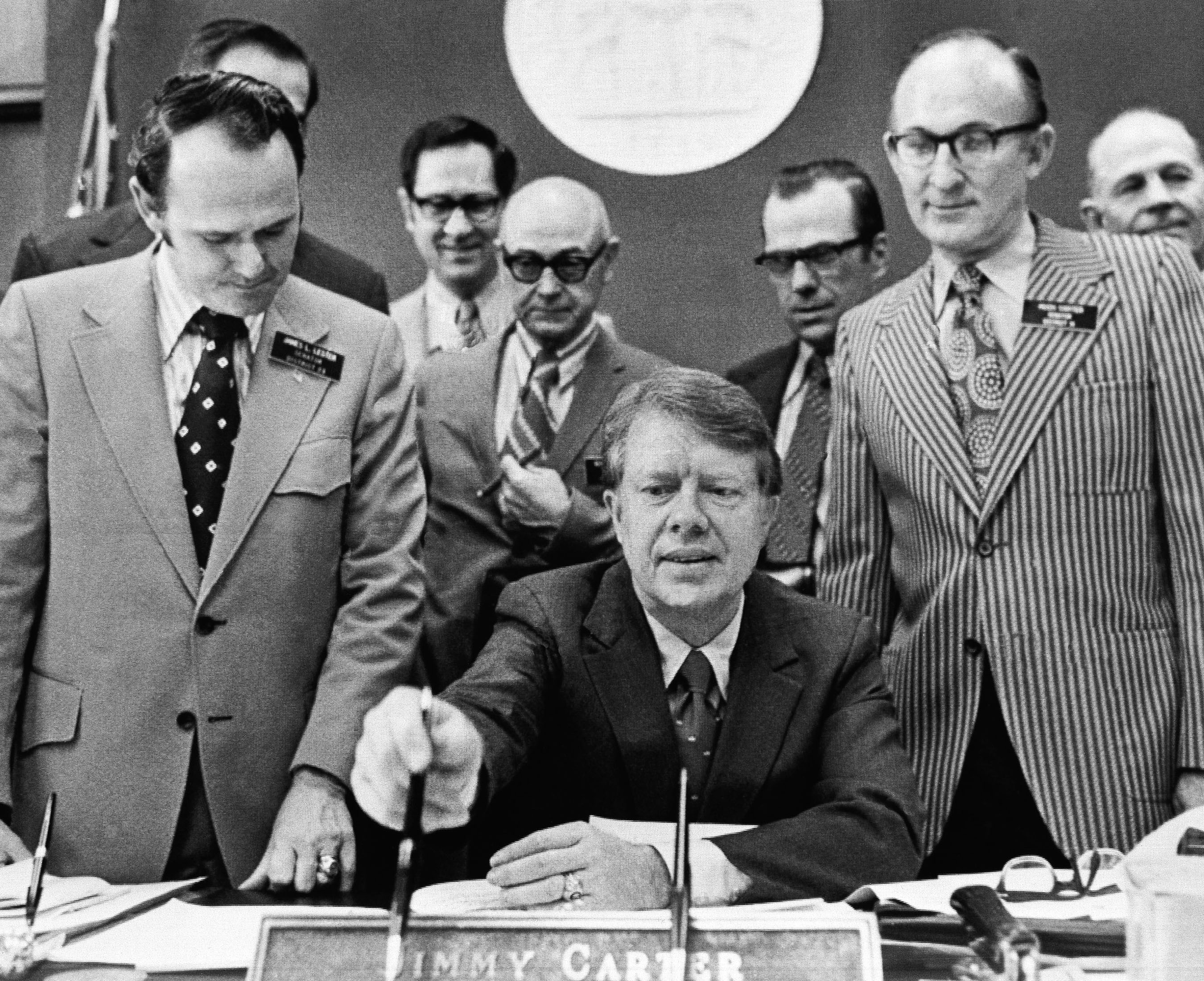 Georgia Gov. Jimmy Carter signs a Georgia Senate House resolution opposing forced busing to achieve integration in the classrooms of the United States, Feb. 25, 1972. The resolution asks Congress to call a constitutional convention for the purpose of proposing an antibusing amendment.