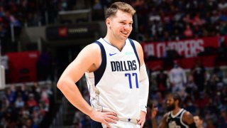 Luka Doncic #77 of the Dallas Mavericks smiles during Round 1, Game 1 of the the 2021 NBA Playoffs on May 22, 2021 at STAPLES Center in Los Angeles, California.