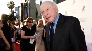 In this March 26, 2015, file photo, Norman Lloyd poses before a 50th anniversary screening of the film "The Sound of Music" at the opening night gala of the TCM Classic Film Festival in Los Angeles. Lloyd, the distinguished stage and screen actor known for his role as a kindly doctor on TV's "St. Elsewhere," has died at 106. Manager Marion Rosenberg said the actor died Tuesday, May 11, 2021, at his home in the Brentwood neighborhood of Los Angeles.