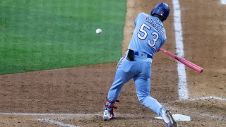 Adolis Garcia #53 of the Texas Rangers hits a three-run home run against the Seattle Mariners during the fifth inning at Globe Life Field on May 9, 2021 in Arlington, Texas.