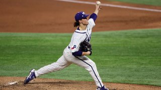 Austin Krob #39 of the TCU Horned Frogs throws against the Arkansas Razorbacks in the second inning during the 2021 State Farm College Baseball Showdown at Globe Life Field on Feb. 22, 2021 in Arlington, Texas.