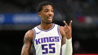 Delon Wright #55 of the Sacramento Kings puts two fingers up during the game against the Dallas Mavericks on May 2, 2021 at the American Airlines Center in Dallas, Texas.