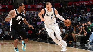 Kristaps Porzingis #6 of the Dallas Mavericks drives to the basket against the LA Clippers during Round 1, Game 1 of the the 2021 NBA Playoffs on May 22, 2021 at STAPLES Center in Los Angeles, California.