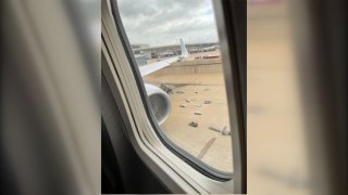 An investigation is underway at DFW Airport after an American Airlines plane hit a light pole.