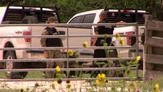 U.S. Navy Security Forces near the site of a crash in Ricardo, Texas, involving two Navy jets on May 17, 2021.