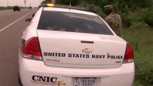 U.S. Navy Security Forces near the site of a crash in Ricardo, Texas, involving two Navy jets on May 17, 2021.