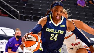 Arike Ogunbowale #24 of the Dallas Wings dribbles during the game against the Phoenix Mercury on June 8, 2021 at Phoenix Suns Arena in Phoenix, Arizona.