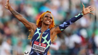 Sha'Carri Richardson celebrates winning the Women's 100 Meter final on day 2 of the 2020 U.S. Olympic Track & Field Team Trials at Hayward Field on June 19, 2021 in Eugene, Oregon.