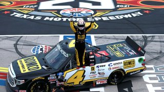 John Hunter Nemechek, driver of the #4 ROMCO Toyota, celebrates after winning the NASCAR Camping World Truck Series SpeedyCash.com 220 at Texas Motor Speedway on June 12, 2021 in Fort Worth, Texas.