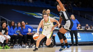 Marina Mabrey #3 of the Dallas Wings drives to the basket during the game as 'ml24; plays defense on June 19, 2021 at College Park Center in Arlington, Texas.