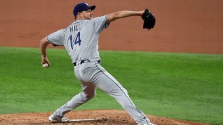 Rich Hill #14 of the Tampa Bay Rays pitches in the first inning against the Texas Rangers at Globe Life Field on June 5, 2021 in Arlington, Texas.